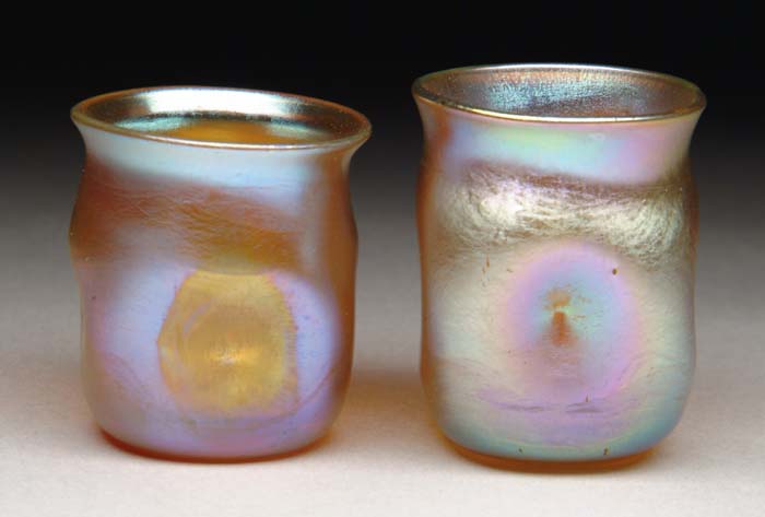 Appraisal: TWO TIFFANY STUDIOS SHOT GLASSES Nice gold Favrile shot glasses