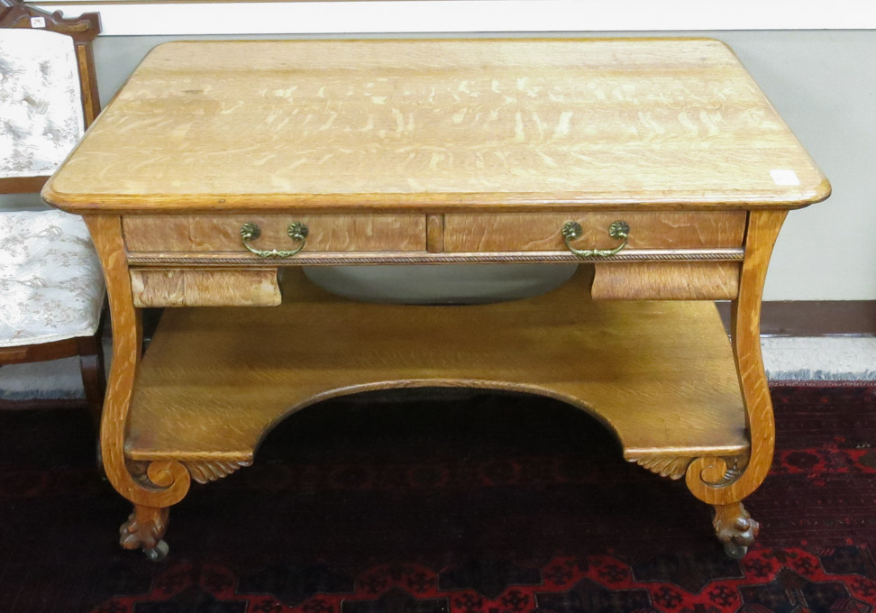 Appraisal: A RECTANGULAR OAK LIBRARY TABLE American c H x W