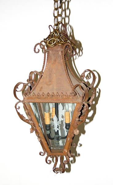 Appraisal: A Renaissance style patinated iron and tole etched glass lantern