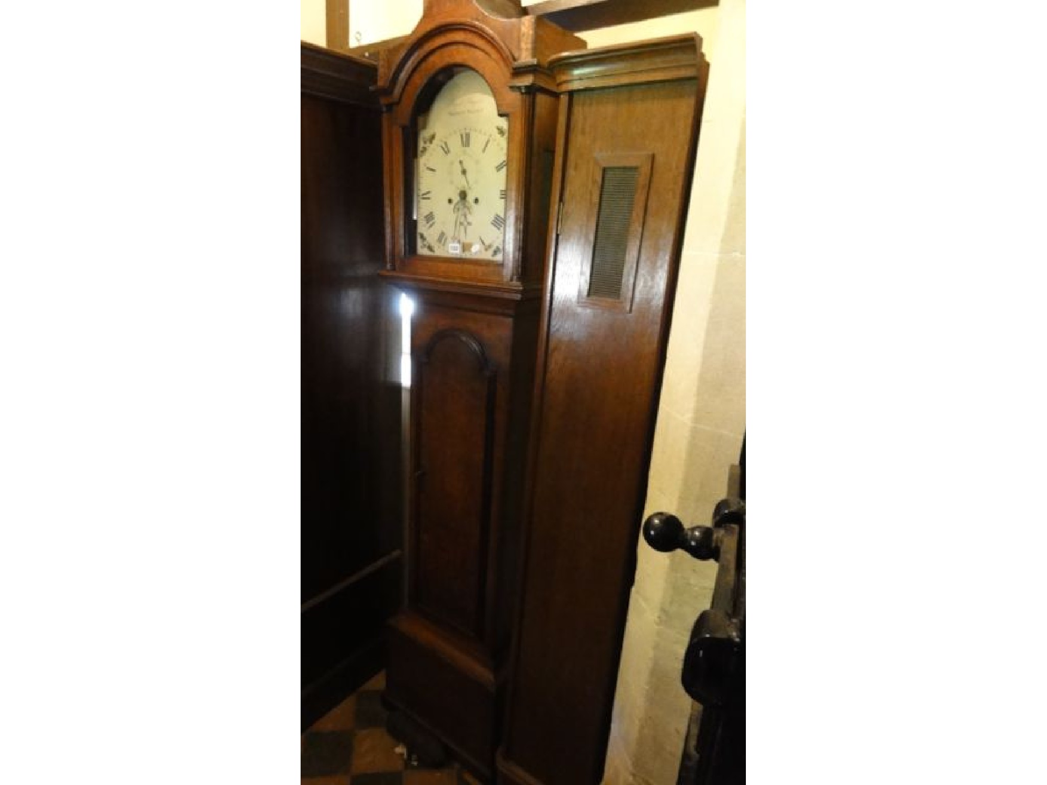 Appraisal: A Georgian oak longcase clock the trunk with full length