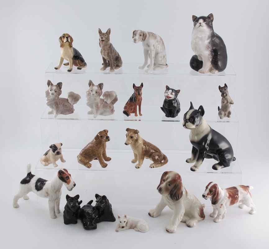 Appraisal: PORCELAIN DOG CAT FIGURINES To include ROYAL DOULTON - Alsatian