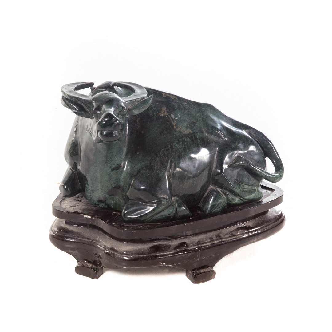 Appraisal: Chinese carved jade recumbent water buffalo with fitted wood stand