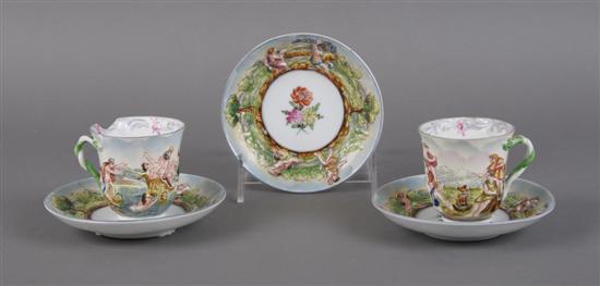 Appraisal: A Group of Capodimonte Demitasse Cups and Saucers Height inches