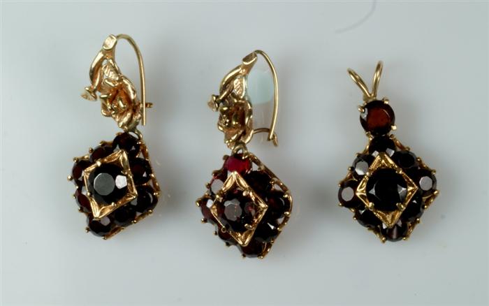 Appraisal: Unmarked YG garnet earring pendant set dwt Estimate -