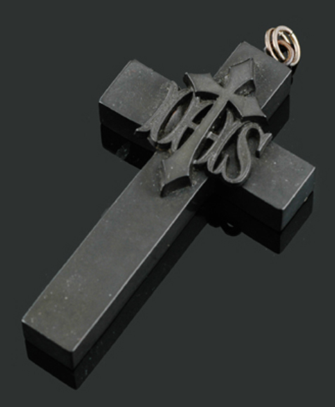 Appraisal: An Antique vulcanite cross pendant The large pendant set in