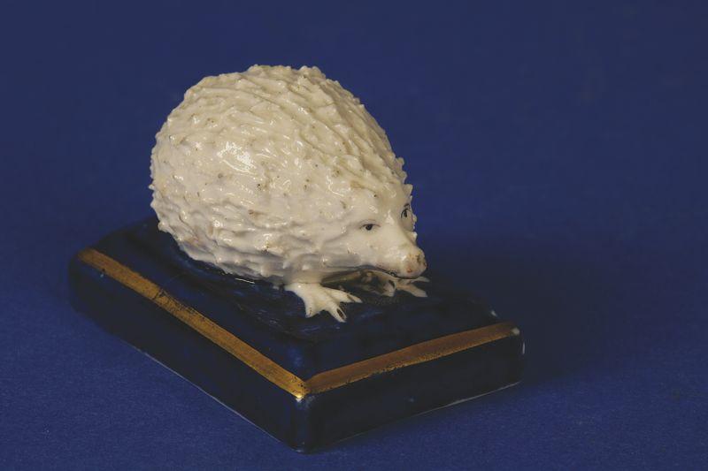 Appraisal: A RARE STAFFORDSHIRE MINIATURE HEDGEHOG with cream glazed moulded body