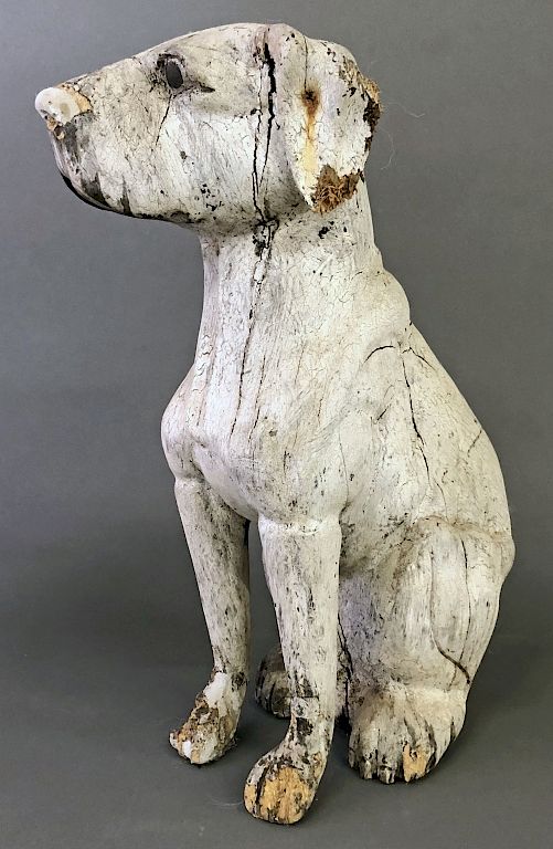 Appraisal: Carved Seated Dog Carved seated dog in old white paint