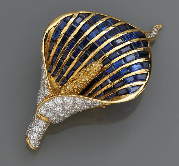 Appraisal: A sapphire diamond and colored diamond calla lily brooch with