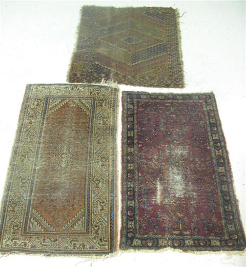 Appraisal: THREE SMALL ORIENTAL RUGS x x and x in