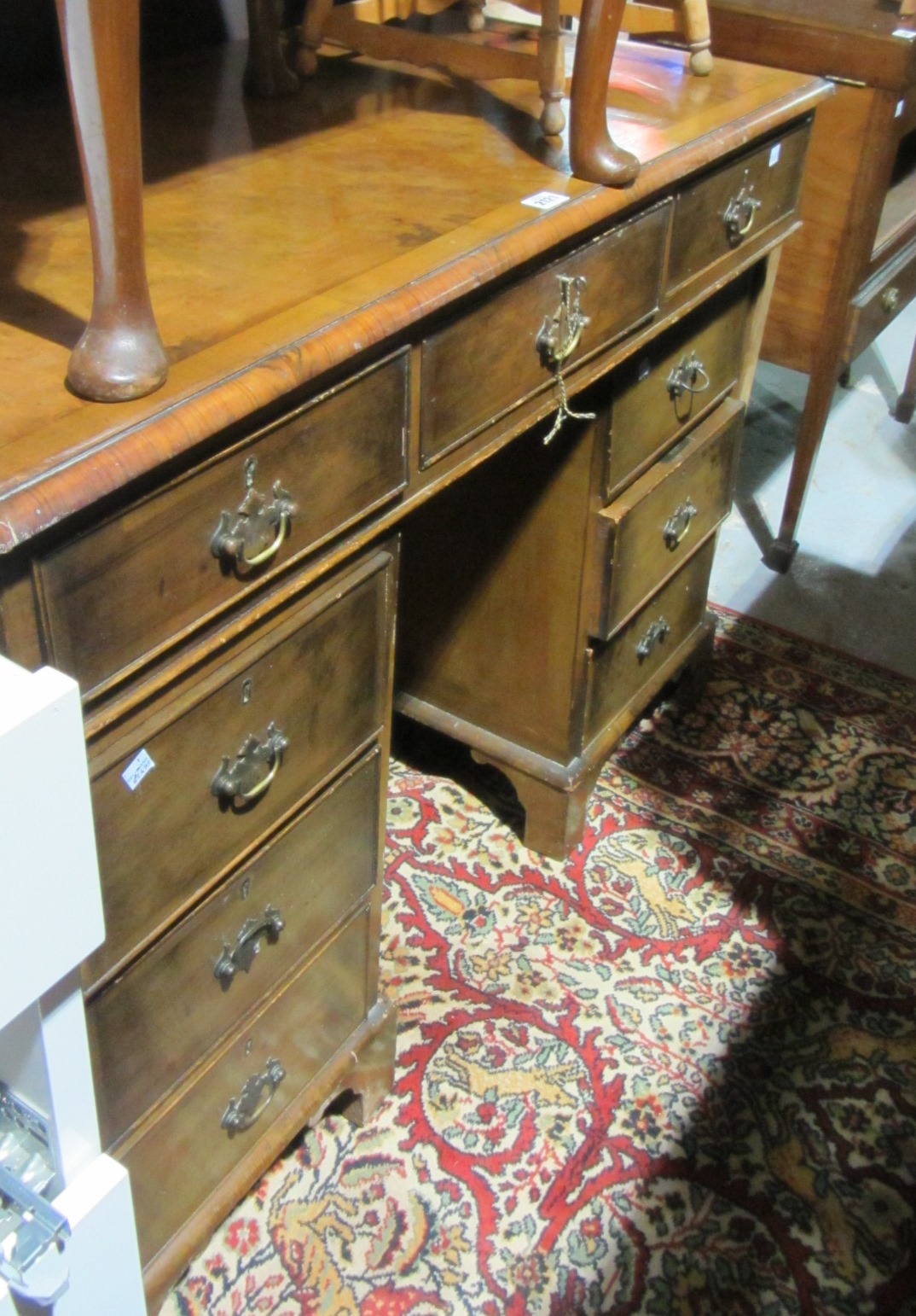 Appraisal: An early th century walnut pedestal desk