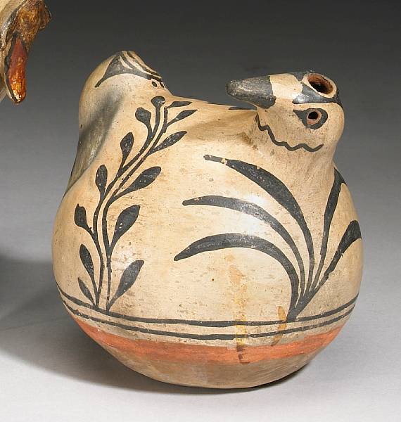 Appraisal: A Cochiti bird effigy jar Decorated with floriform motifs on