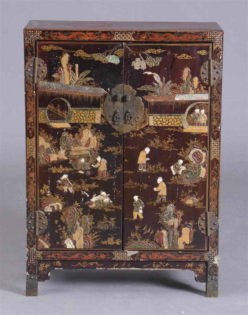 Appraisal: CHINESE IVORY AND SOFT STONE-MOUNTED MAROON LACQUER CABINET Enclosed by