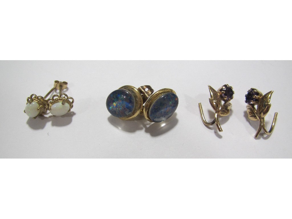 Appraisal: Three pairs of gold stud earrings to include opals black