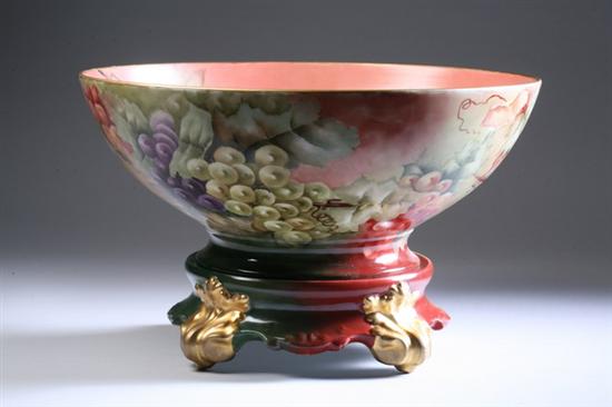 Appraisal: LIMOGES PORCELAIN PUNCHBOWL ON STAND Circa Tressemann Vogt Hand-painted allover