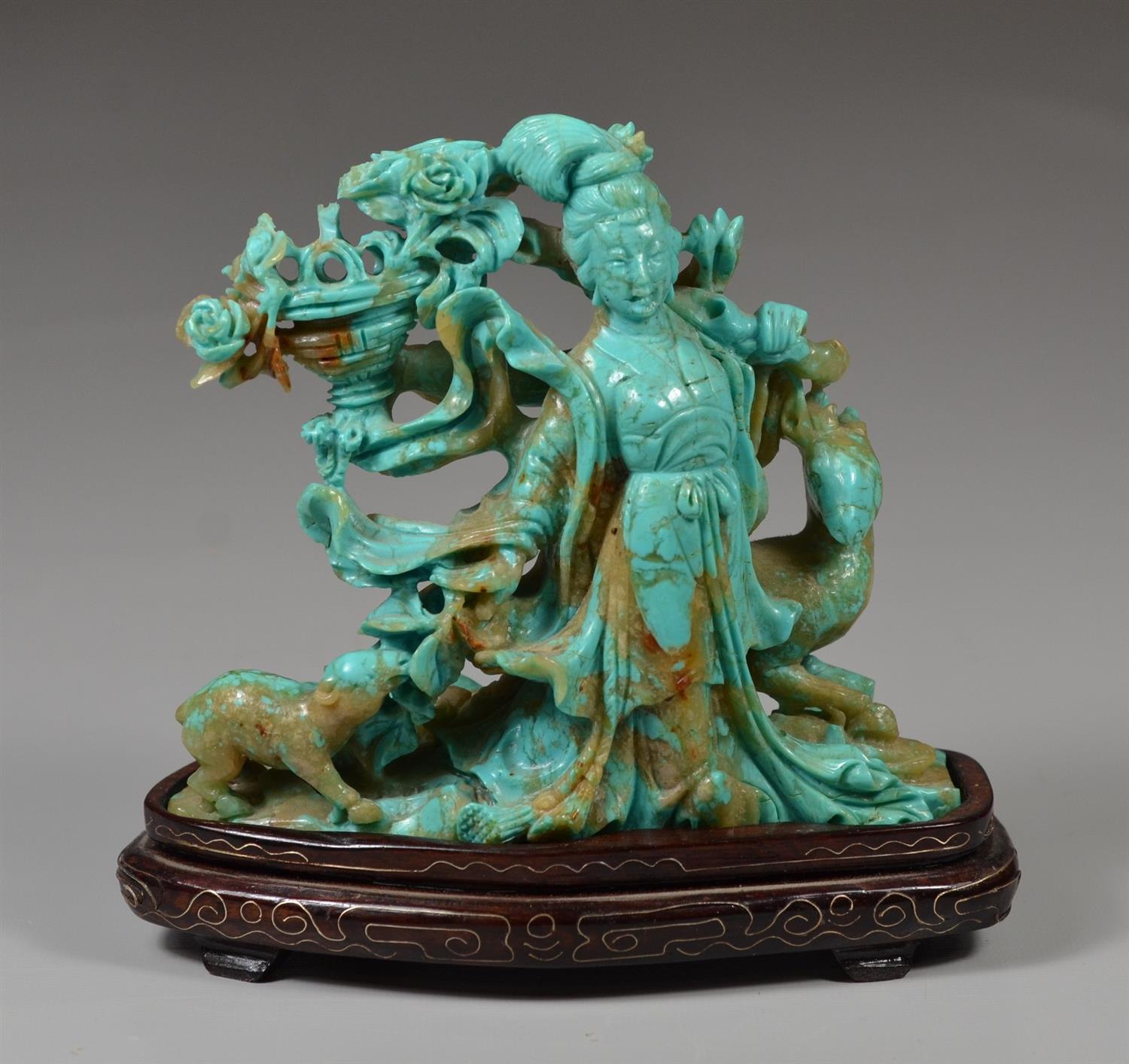 Appraisal: Carved turquoise figure of a beauty with a dog and