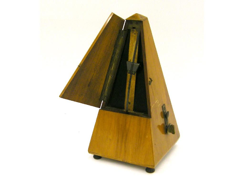 Appraisal: Metronome by Maelzel in a satinwood pyramid case high