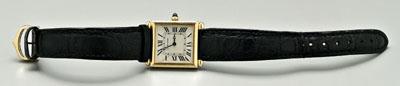 Appraisal: Gent s Cartier gold wristwatch white metal face with black