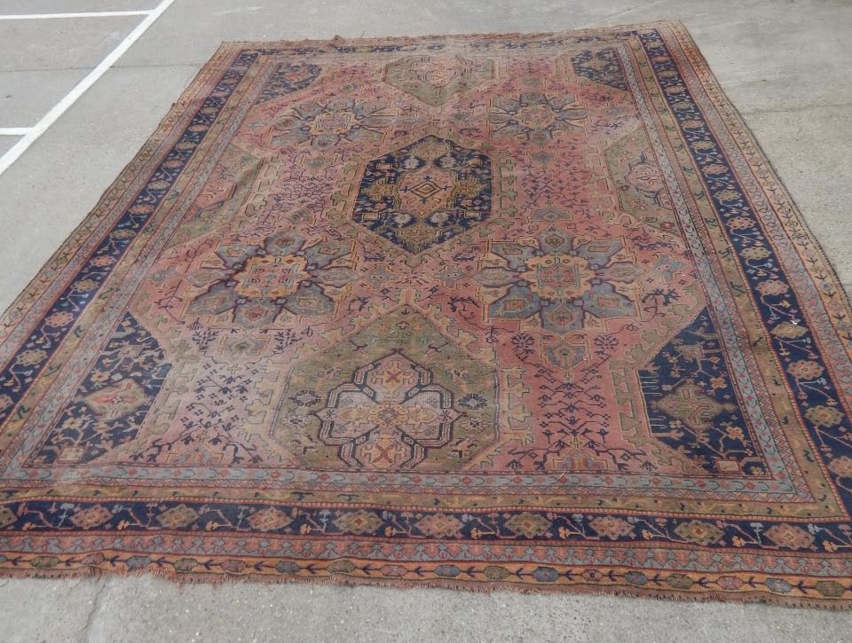 Appraisal: A Turkey type carpet with a geometric design with medallions