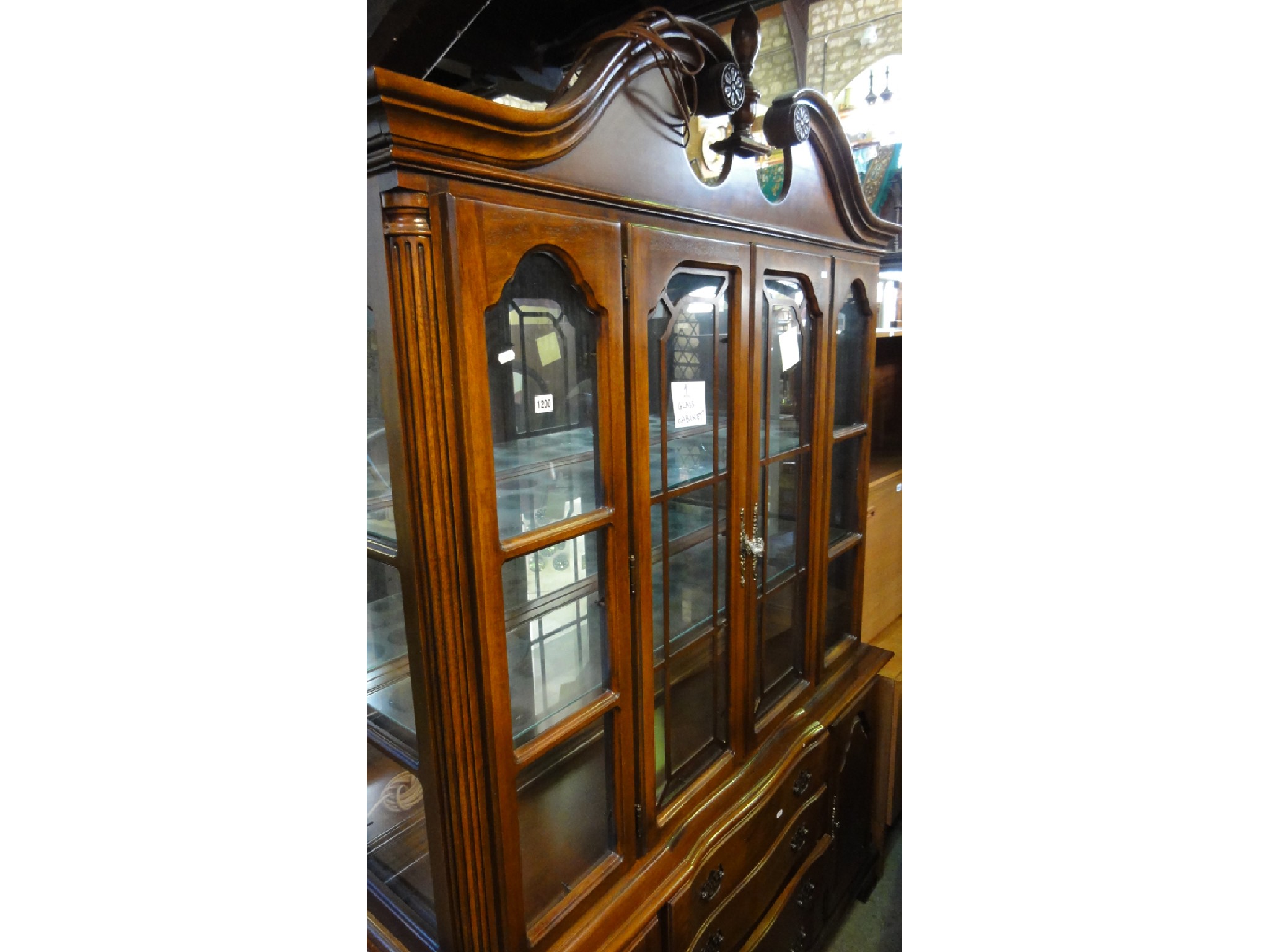 Appraisal: A reproduction Chippendale revival side cabinet probably American the upper