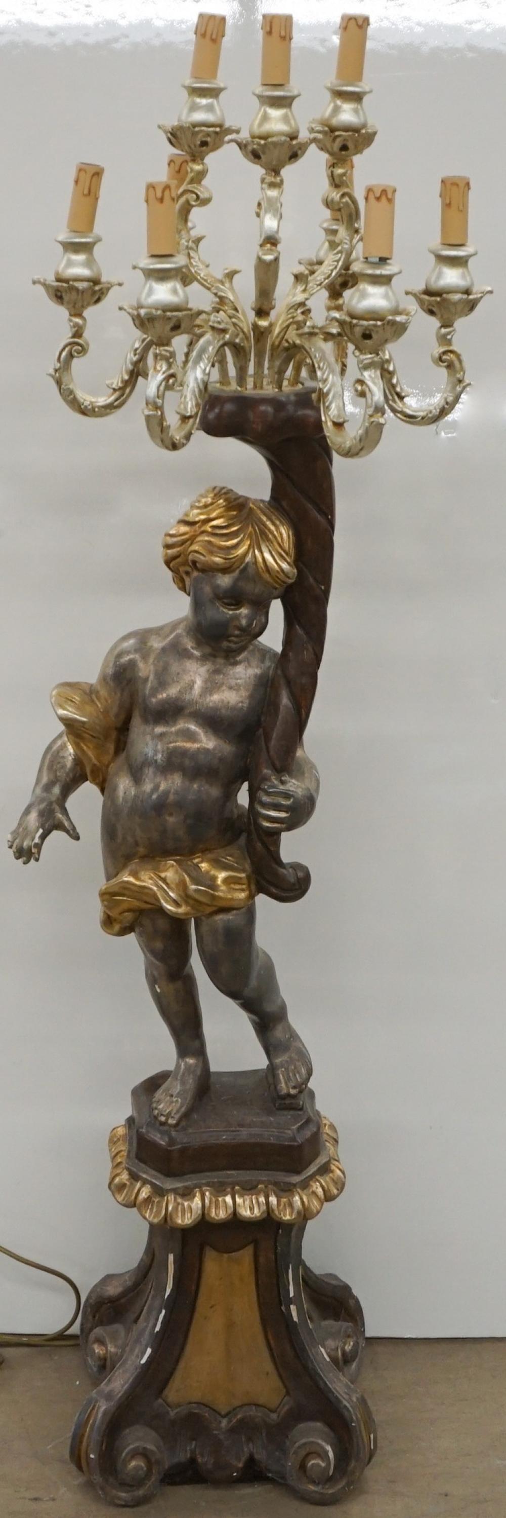 Appraisal: Italian Baroque Style Gilt and Silvered Wood 'Putto' Nine-Light Torchiere