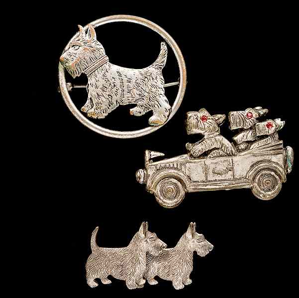 Appraisal: Trio of Silver Dog Brooches A trio of Dog brooches