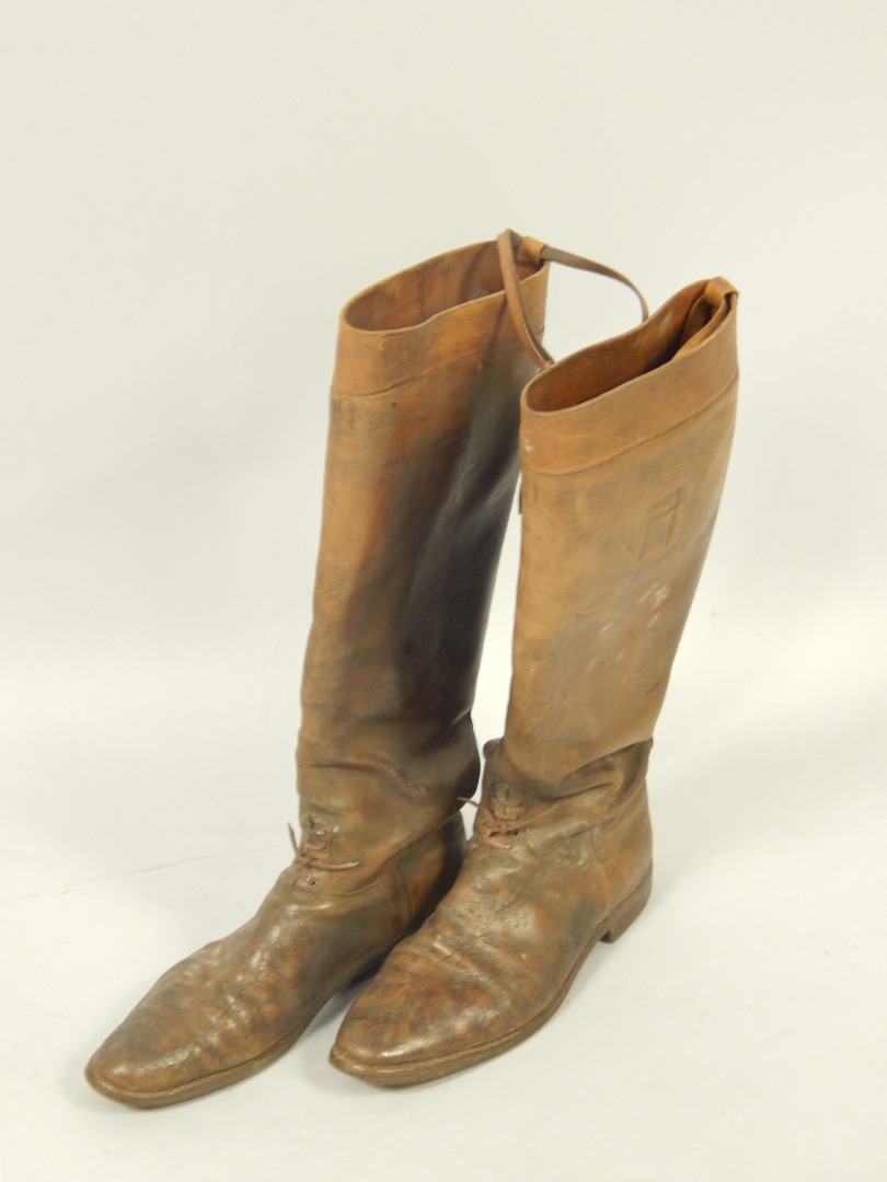 Appraisal: A pair of Victorian gentleman's tan leather riding boots