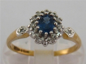 Appraisal: A carat yellow gold sapphire and diamond cluster ring the