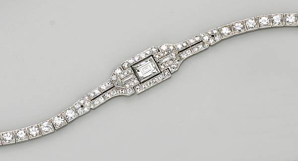 Appraisal: An art deco diamond and platinum bracelet centering a rectangular