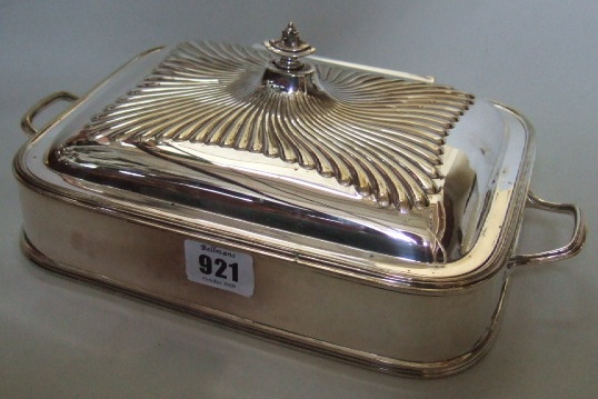 Appraisal: A plated rectangular hinge lidded twin handled bacon dish with