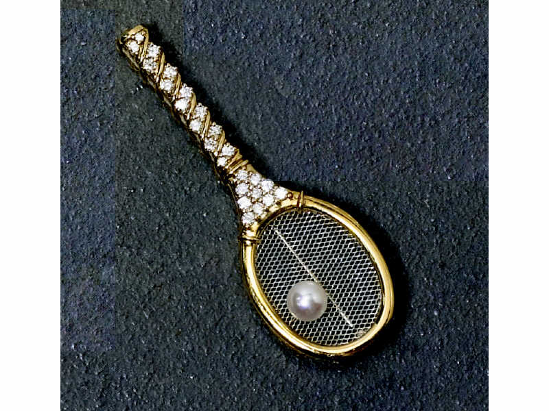 Appraisal: DIAMOND TENNIS RACKET BROOCH k yellow gold with platinum center