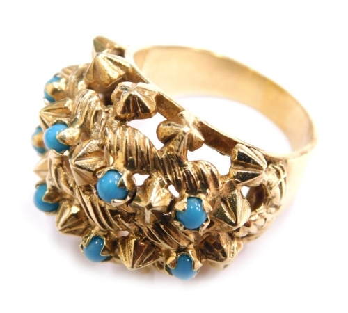 Appraisal: A ct gold cluster ring claw set with eight turquoise