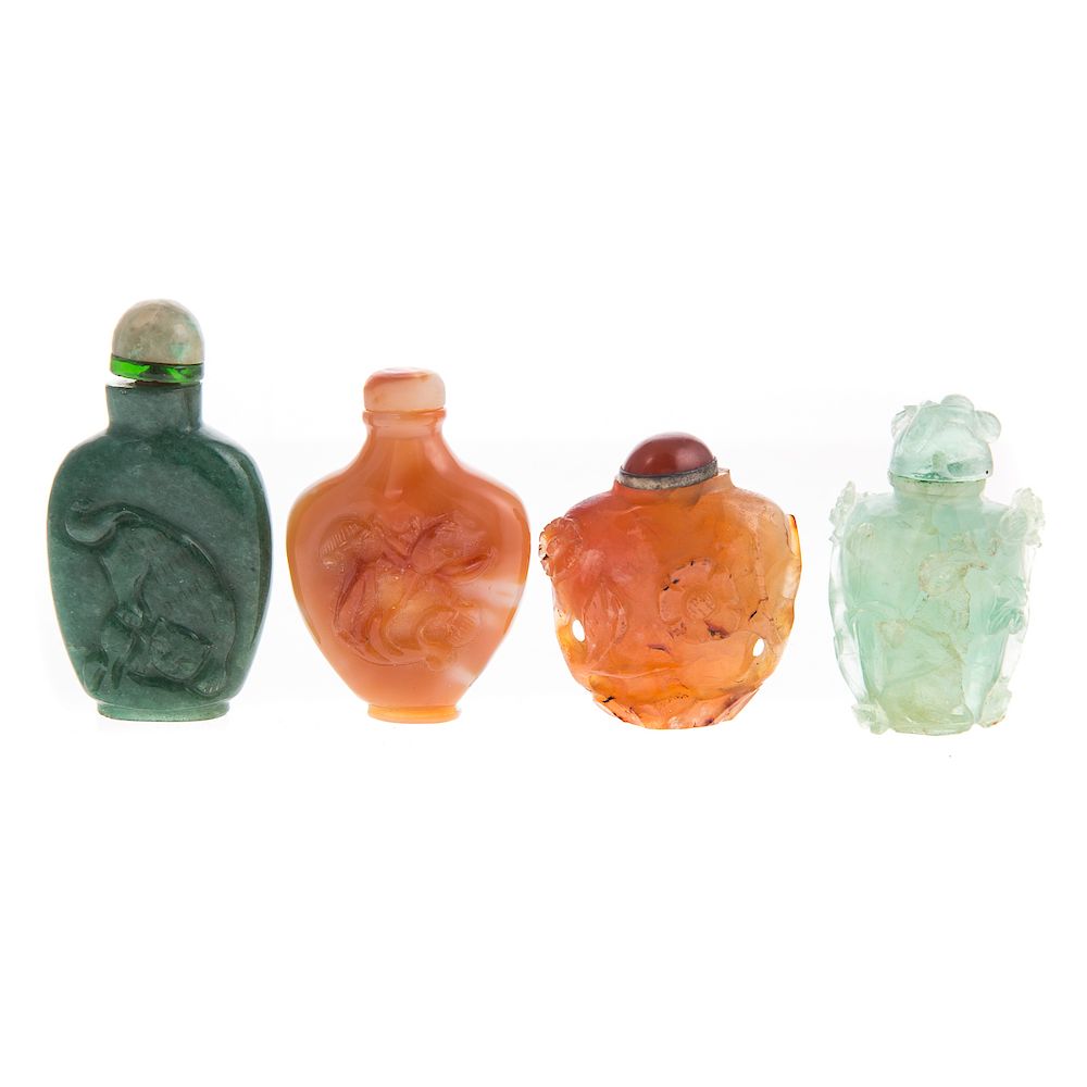 Appraisal: Four Chinese Carved Hardstone Snuff Bottles all with relief vine