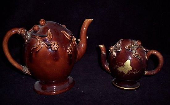 Appraisal: A Rockingham brown glaze Cadogan teapot decorated flowers and berries