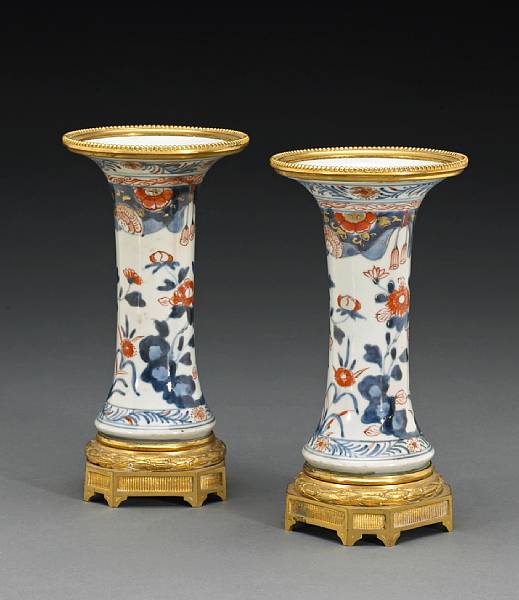 Appraisal: A pair of Imari porcelain beaker vases th Century Each