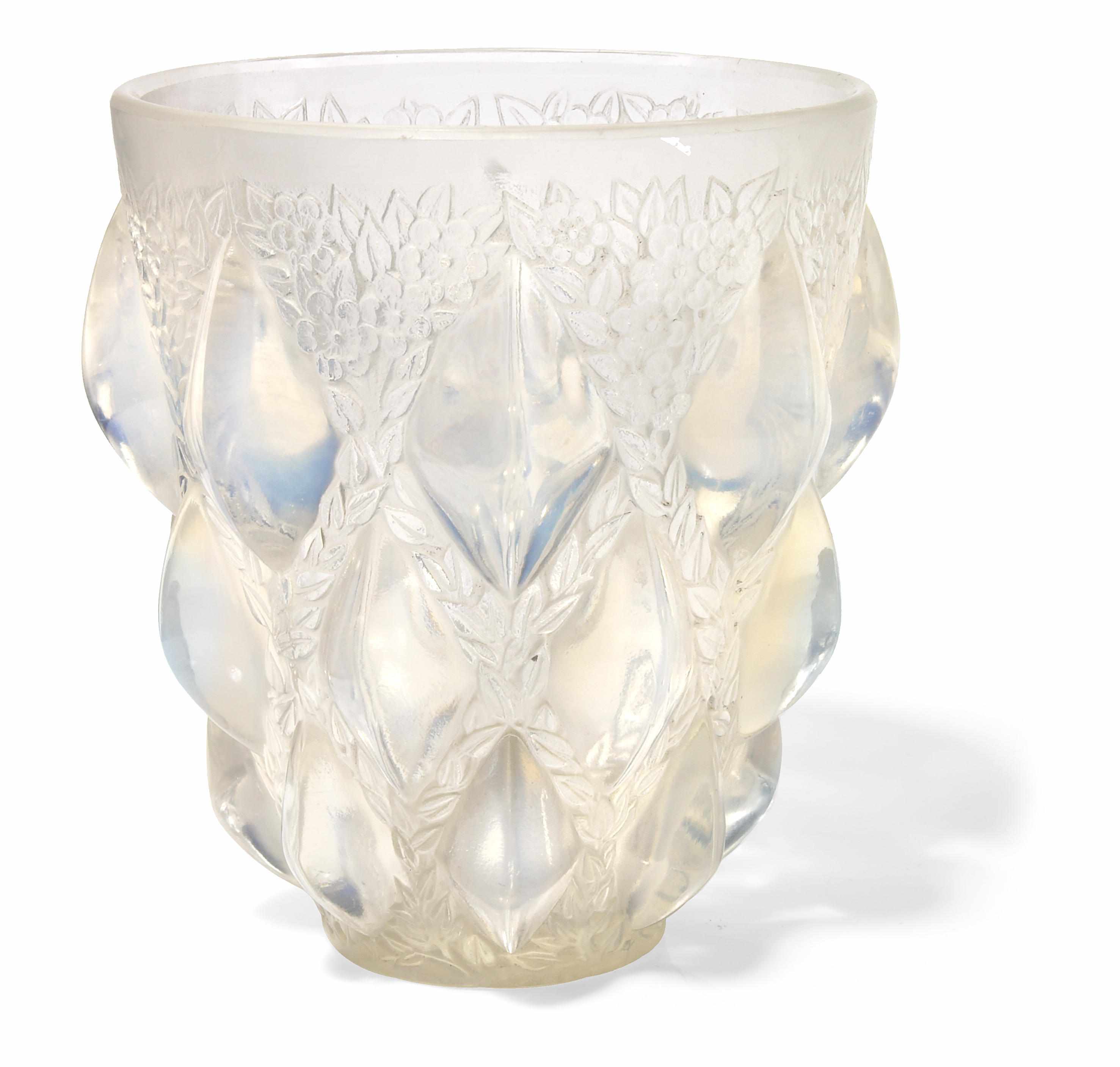 Appraisal: A Ren Lalique opalescent molded glass vase Rampillon Marcilhac model