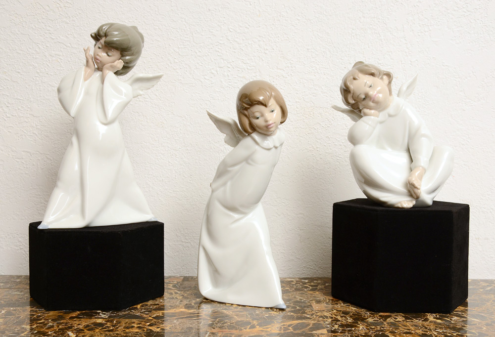 Appraisal: LLADRO PORCELAIN ANGEL FIGURINES Designed by Salvador Debon all in