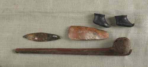 Appraisal: Danish axe and knife together with two pottery slippers and