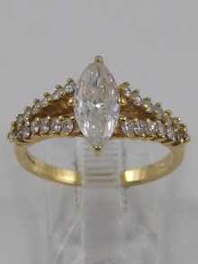 Appraisal: A fine diamond solitaire ring with diamond set shoulders the