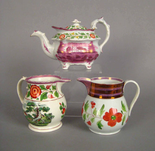 Appraisal: Pink luster teapot th c h together with two pitchers