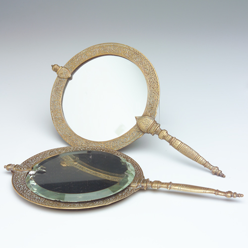 Appraisal: TIFFANY CO MAKERS Pair of brass hand-held mirrors in a