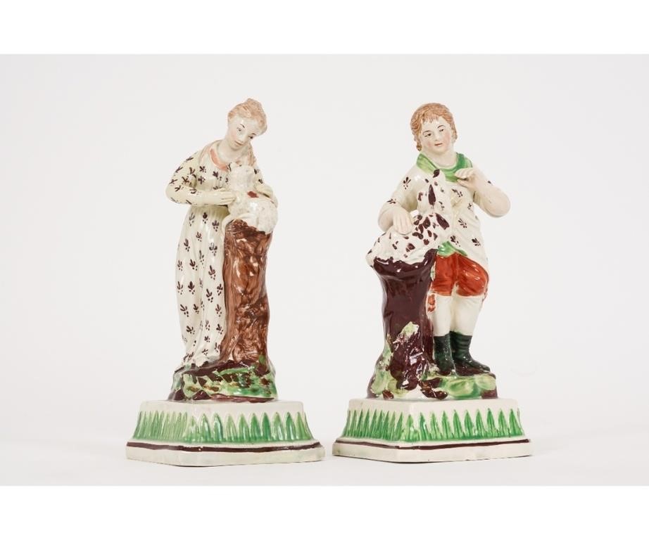 Appraisal: Pair of rare Staffordshire Prattware shepherd and shepherdess circa h