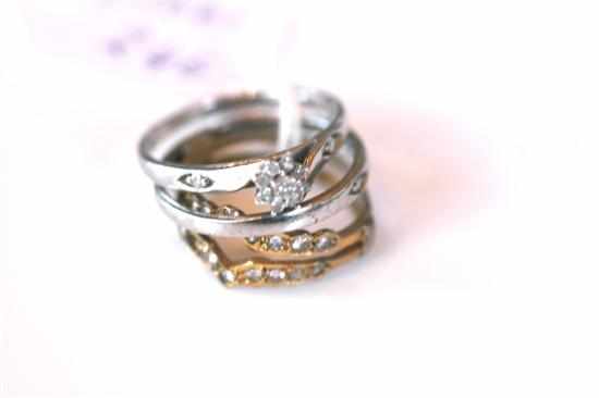 Appraisal: THREE RINGS INCLUDING A DIAMOND CLUSTER RING AND A THREE