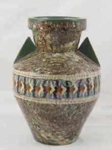 Appraisal: A geometrical mosaic ceramic vase with triangular handles signed ''