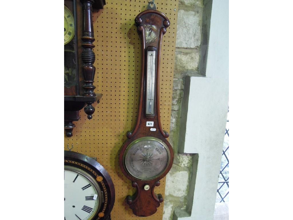 Appraisal: A th century banjo shaped mahogany cased barometer thermometer with