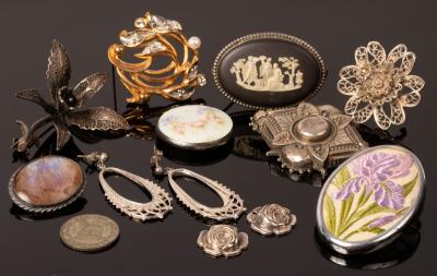 Appraisal: A Victorian silver brooch Birmingham with glazed locket panel to