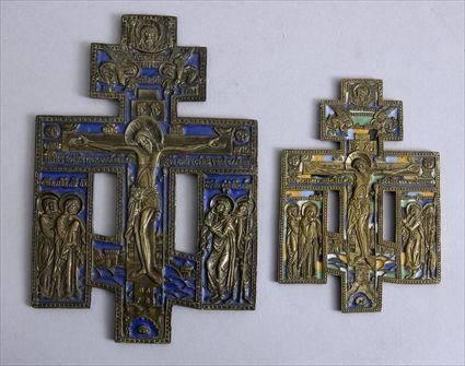 Appraisal: TWO RUSSIAN ENAMELED AND ENGRAVED BRASS CRUCIFIXES Each with corpus