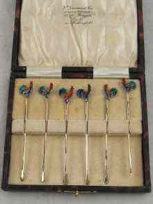 Appraisal: A boxed set of six silver gilt cocktail sticks with