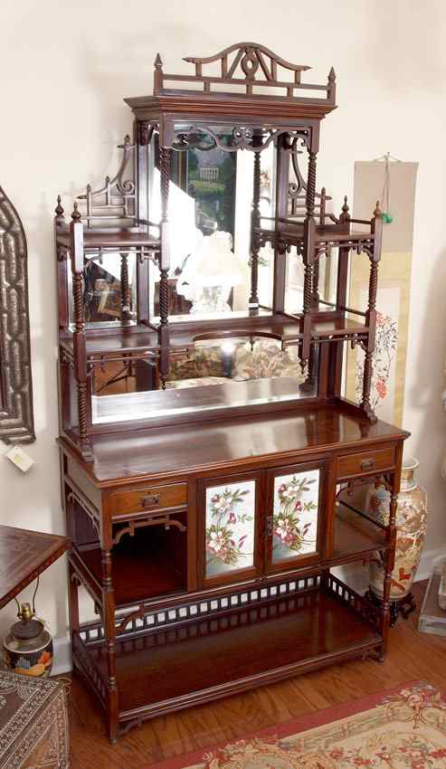 Appraisal: AESTHETIC MOVEMENT ETAGERE Carved and pierced fretwork with decorative supports