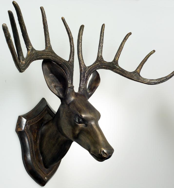 Appraisal: PATINATED BRONZE STAG'S HEAD th century realistically modelled on an