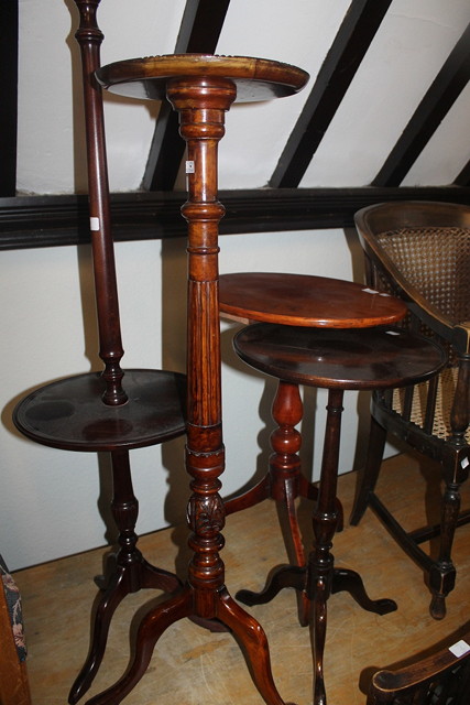 Appraisal: A WALNUT JARDINIERE STAND a Victorian tripod table an Edwardian